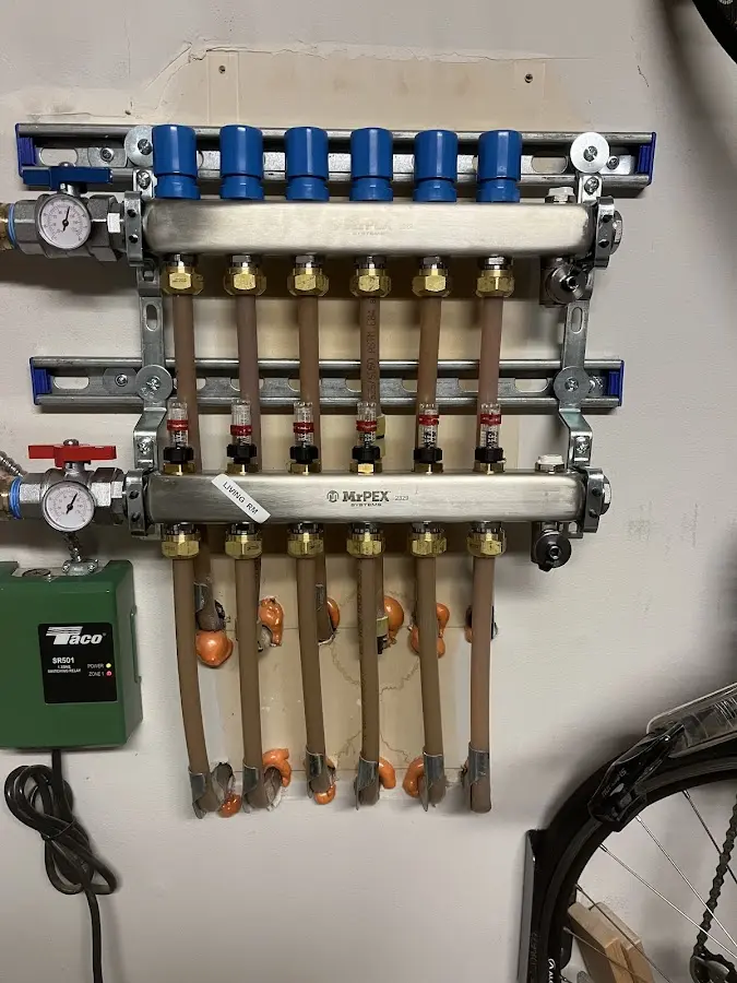 Plumber performing Gas Line Installation at a residential property in New Milford