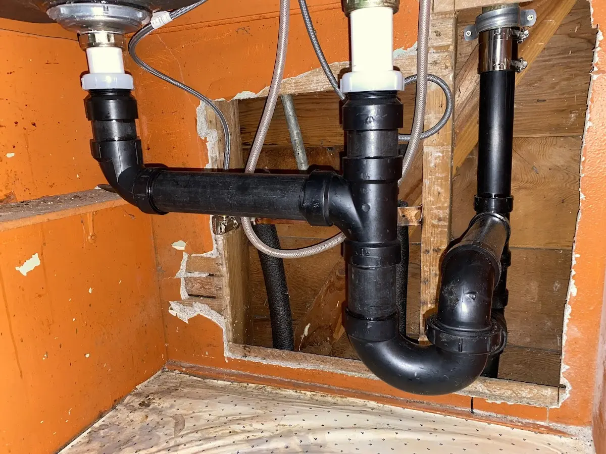 Professional Garbage Disposal Repair equipment and tools on the job in New Milford
